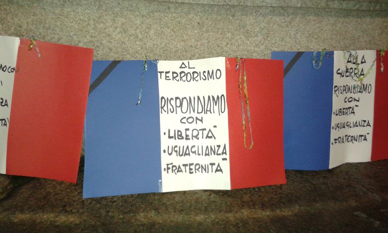 Image for Milano abbraccia la Francia: fiori e candele per Parigi